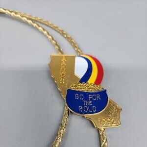 VINTAGE 1992 SHRINER ENAMEL MASONIC BOLO TIE GO FOR THE GOLD DESIGN